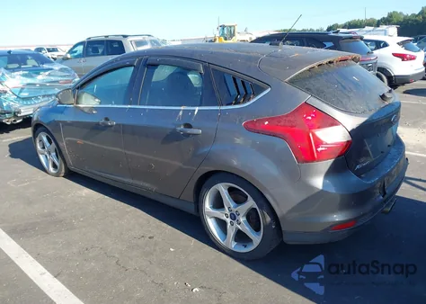 2014 Ford Focus Titanium z USA, uszkodzony, nr VIN 1FADP3N26EL190505